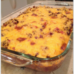 This image shows Bubble Up Chili Bake after baking in a clear baking dish.