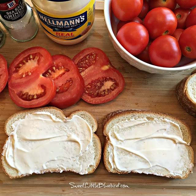 Bread with Mayo and Sliced tomatoes to make a Tomato Sandwich.