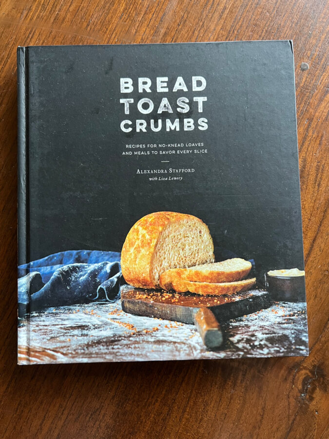 This is a photo of the cookbook - Bread Toast Crumb, on a table.