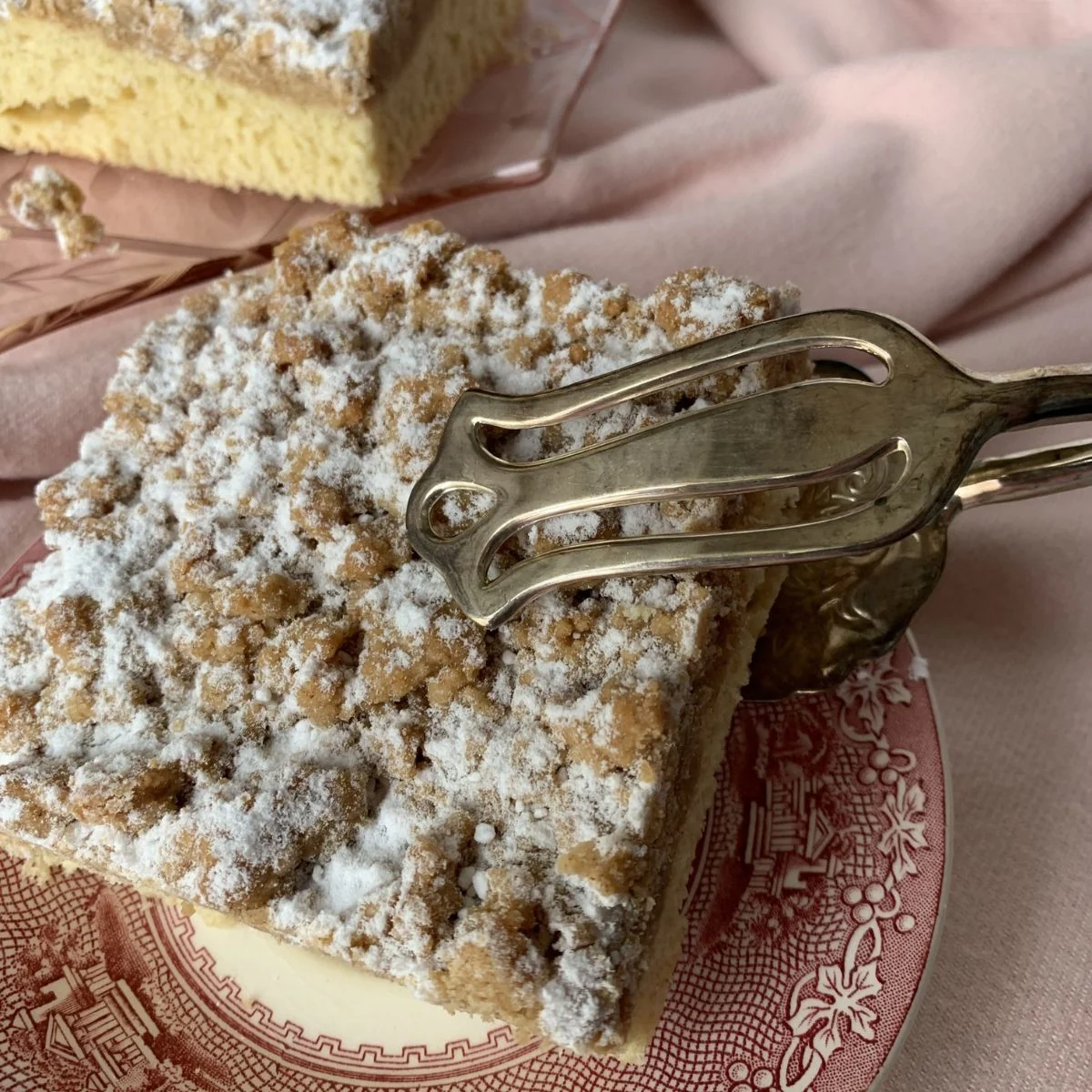 This is a photo of a piece of coffee cake on a plate.