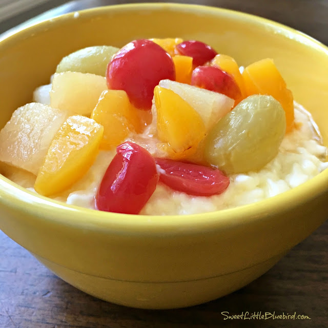 Cottage Cheese Fruit Salad served in a yellow bowl.