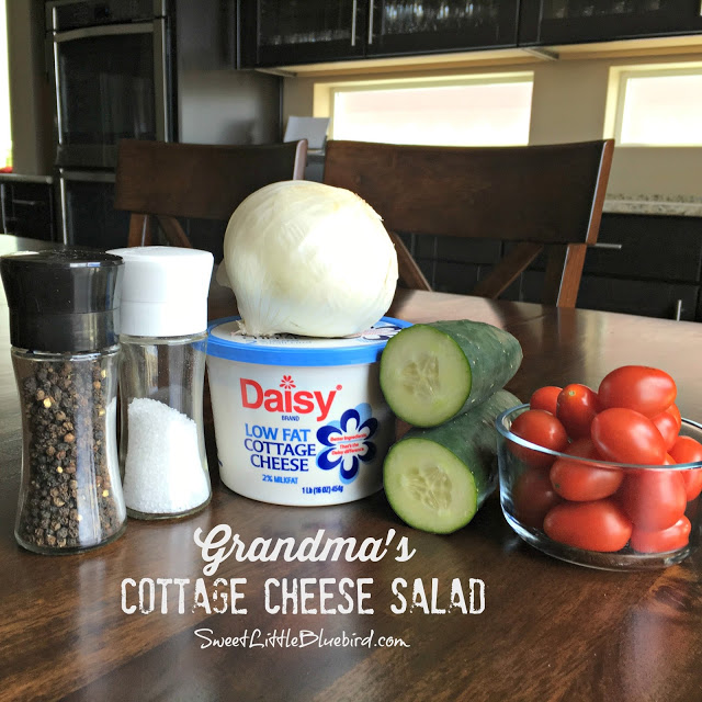This photo shows some of the ingredients for the salad - salt and pepper, cottage cheese, onion, cucumber and tomatoes. 
