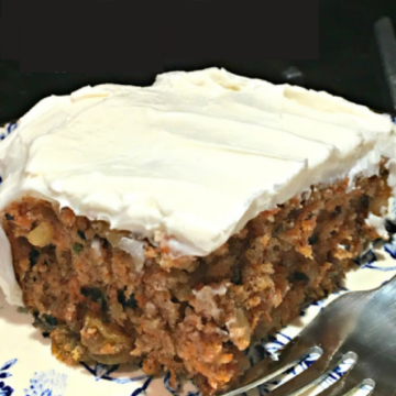 This is a photo of Crazy Carrot Cake on a plate with a fork.