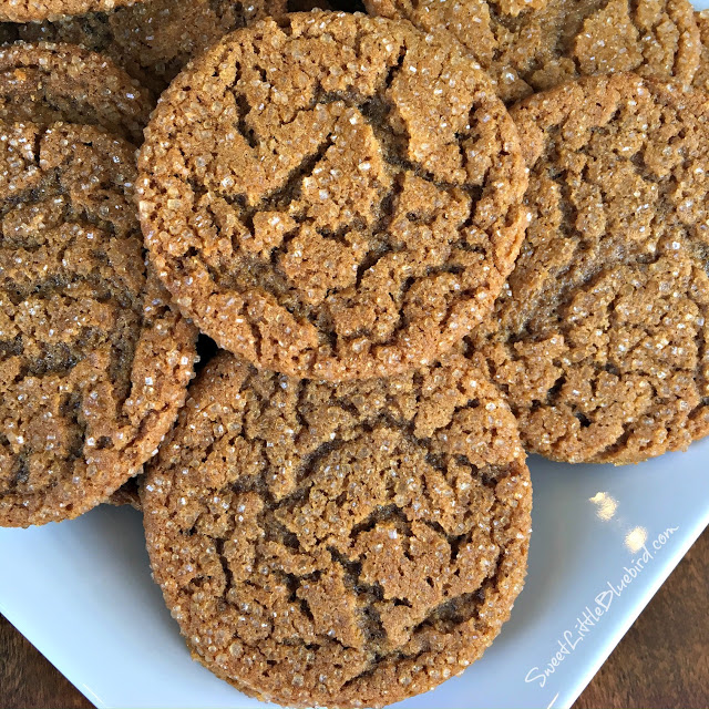 This photo shows the molasses sugar cookies served on a white plate. 