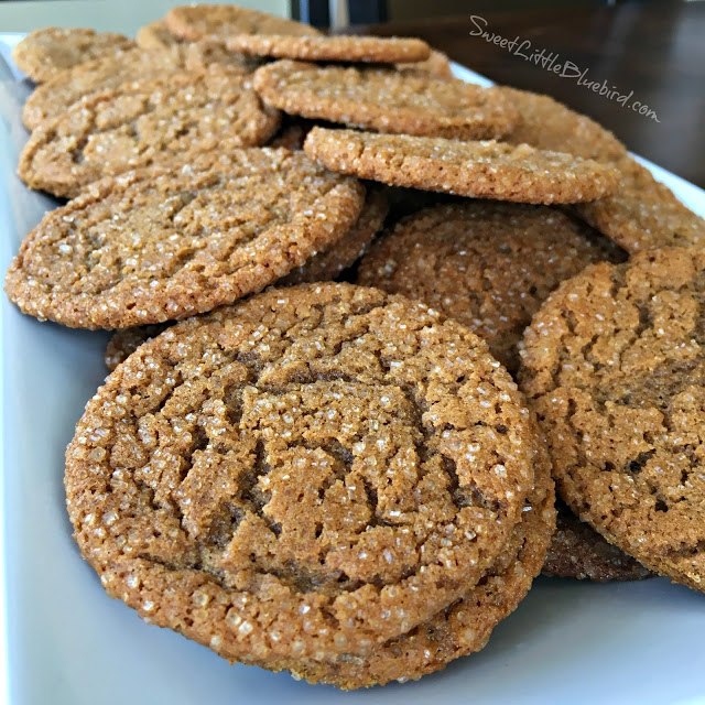 This photo shows the molasses sugar cookies served on a white plate. 