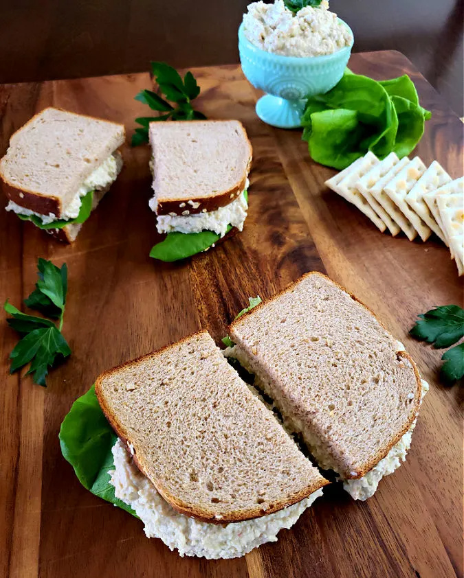 Copycat Chick Fil-A Chicken Salad Sandwiches on a cutting board