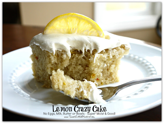 Piece of Lemon Crazy Cake on a plate with a a fork with a piece of cake, ready to eat.