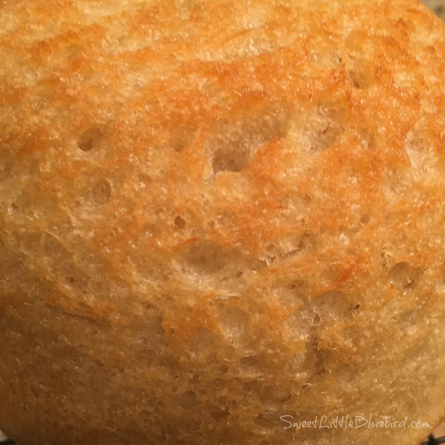 This is a close up photo of the bread showing the buttery crust. 