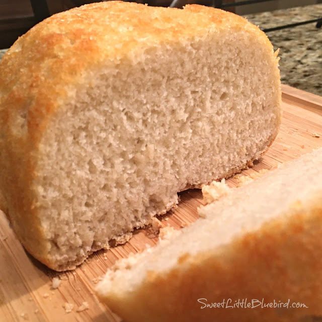 This is a photo of the loaf of peasant bread cut, showing the inside. 