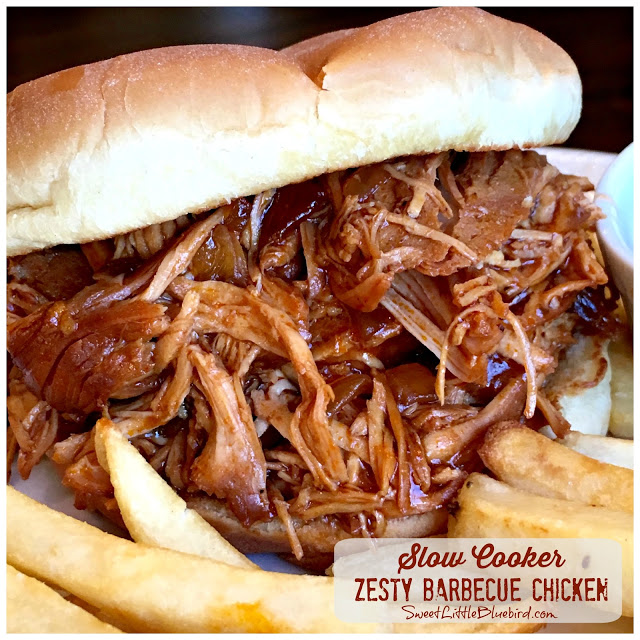 SLOW COOKER ZESTY BARBECUE CHICKEN Sandwich with french fries.