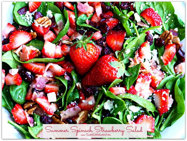 Photo of Strawberry Spinach Salad in a white serving bowl.