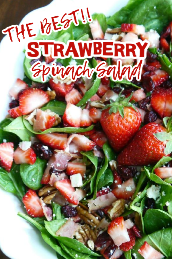 This is a photo of Strawberry Spinach Salad in a white serving bowl.