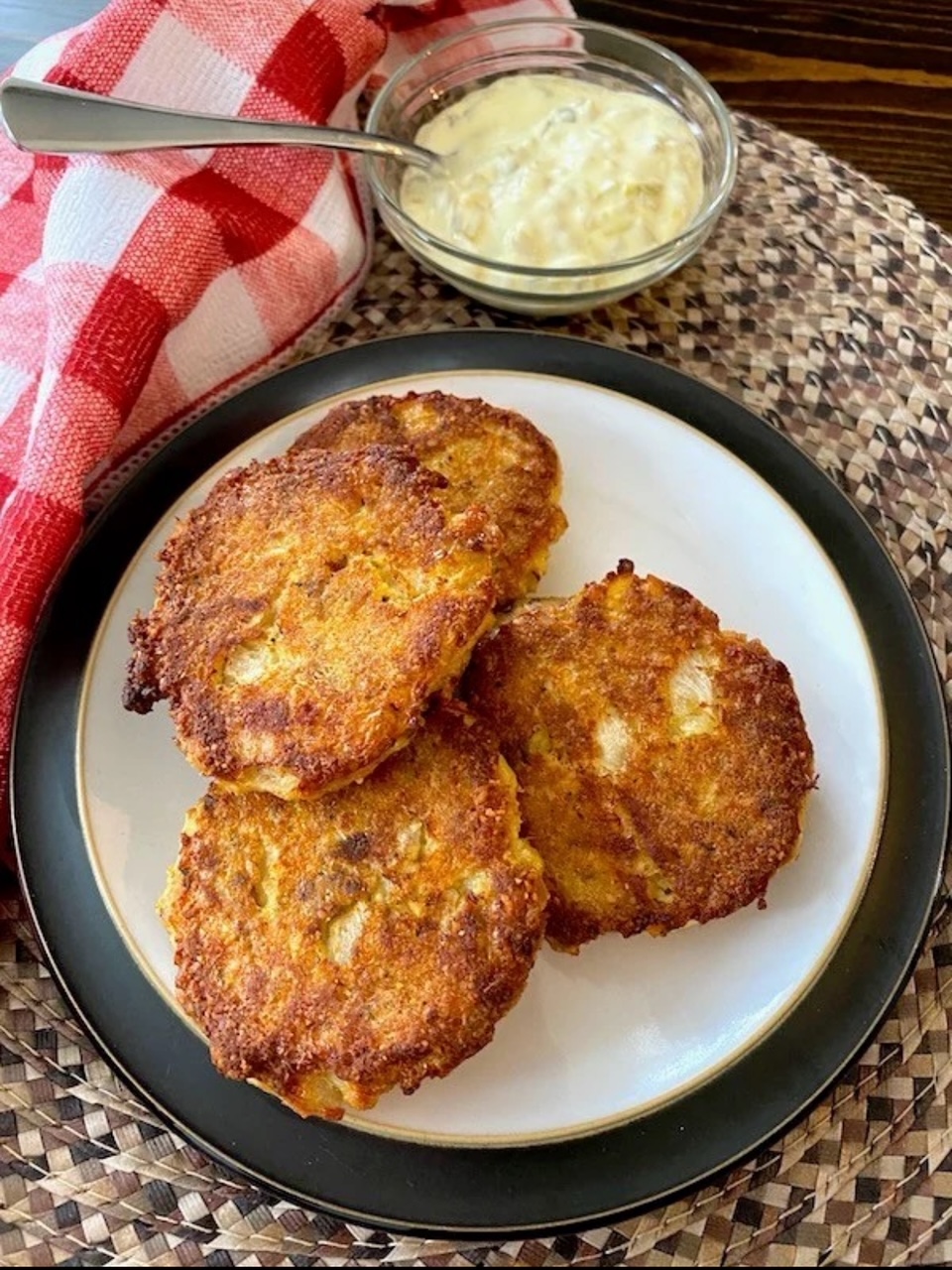 Crispy Oven-Fried Salmon Patties Three Oven-Fried Salmon Patties on a plate, ready to eat.