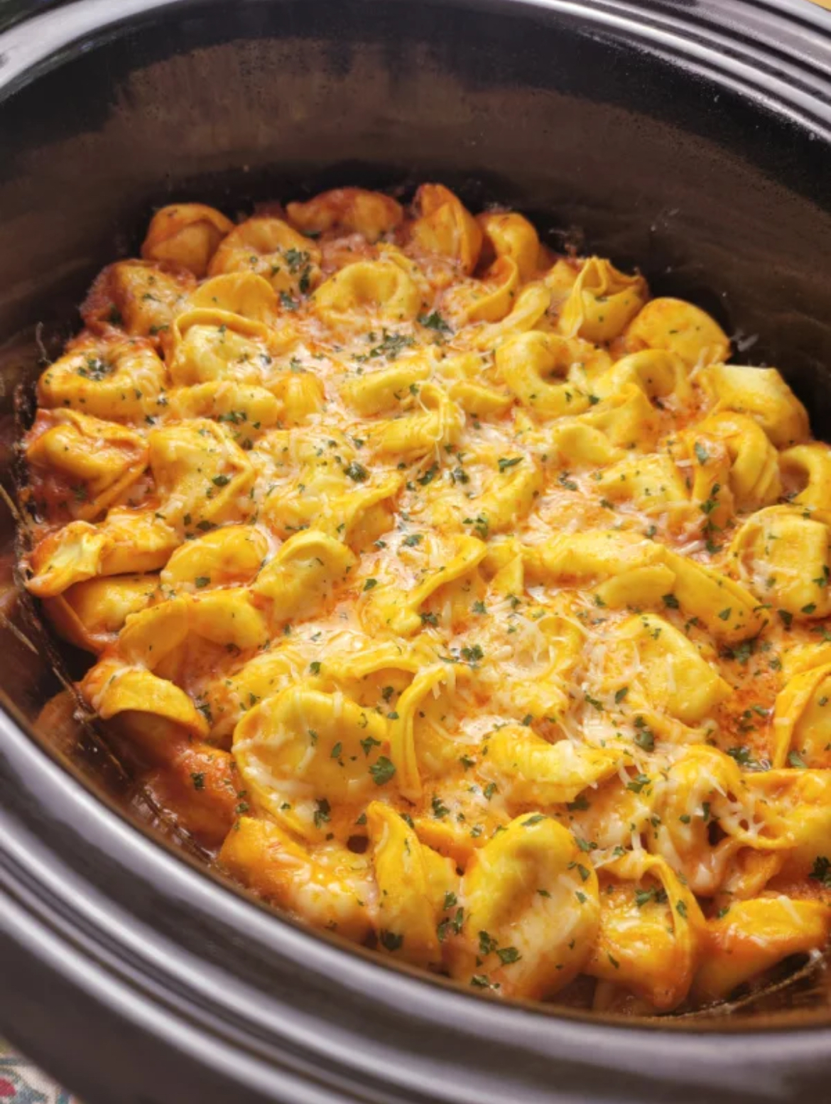 Tortellini with Italian Sausage in a Crock Pot, cooked, ready to serve. 