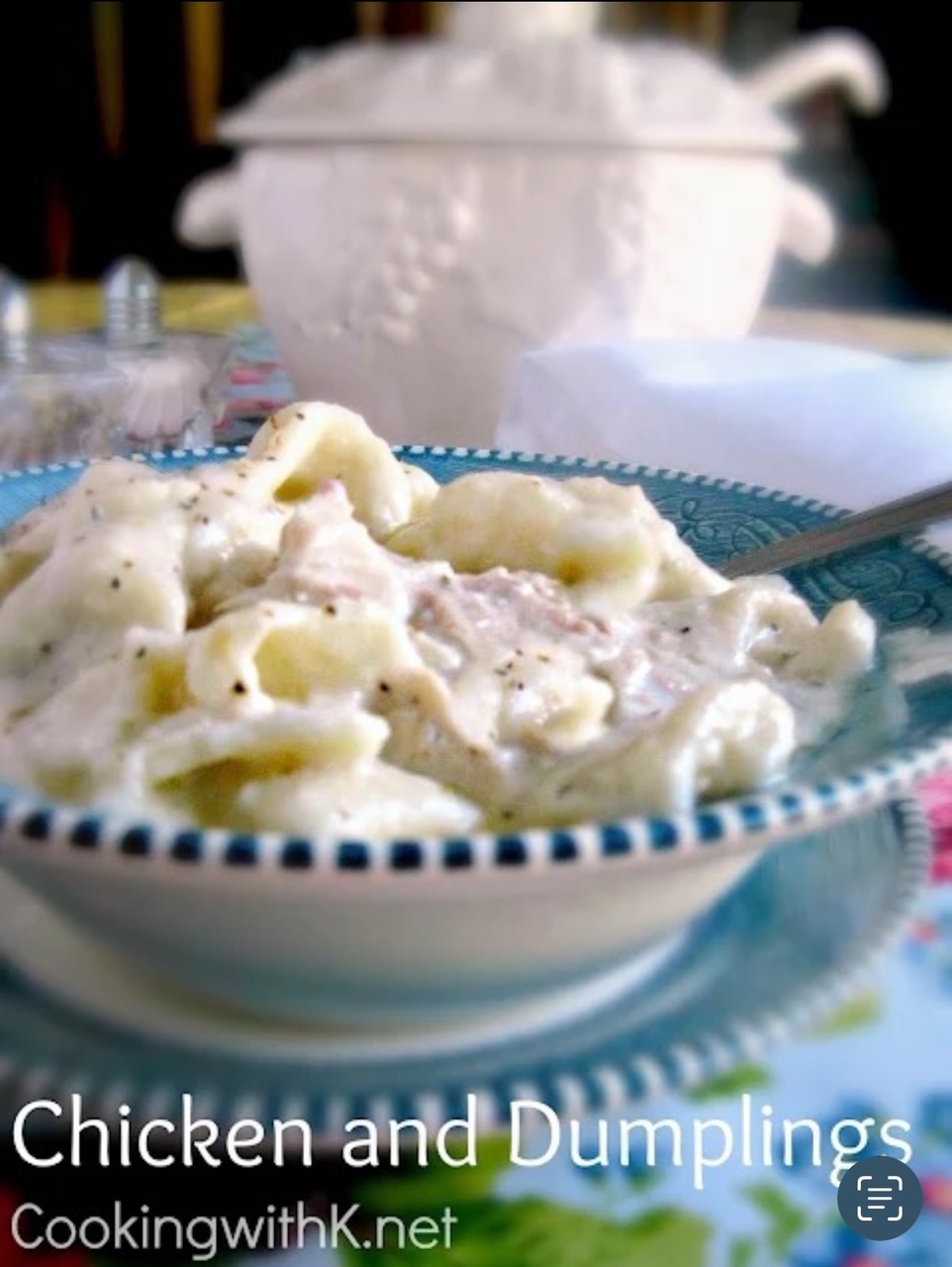 Homemade Chicken and Dumplings Homemade Chicken and Dumplings served in a blue and white bowl with a spoon.