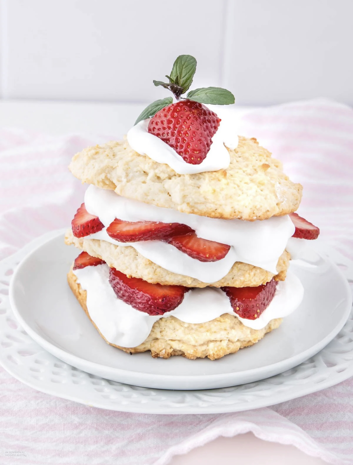 This image shows Bisquick Strawberry Shortcake served on a white plate. 